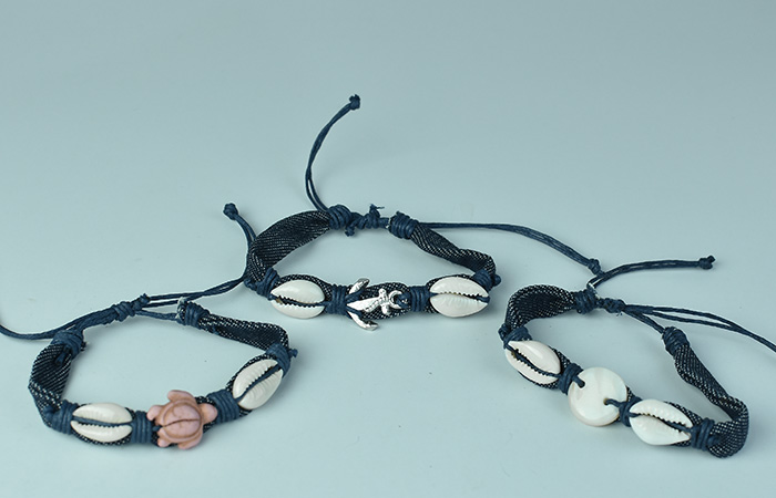 handmade macrame bracelet with silver and bead plated charms