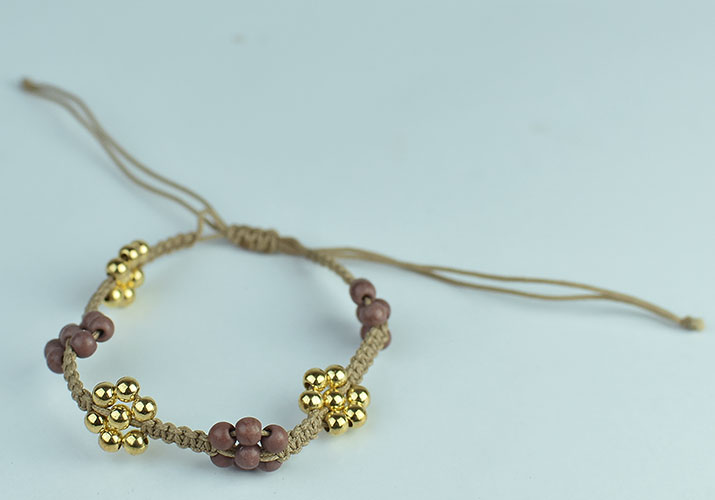 wholeasle Bracelet round gold bead chrams with hand braided in macrame style