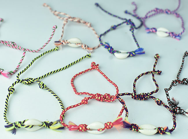 supply beautiful bracelet shell charms with colorful braided from Bali Indonesia