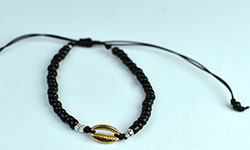 Bead breclet with strings and metal ornament made in Bali and cheap price