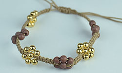 Mecrame bracelet with flower bead made in  Bali cheap price